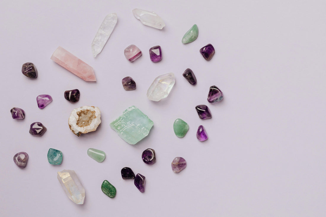 Healing crystals for beginners, including amethyst, rose quartz, and clear quartz